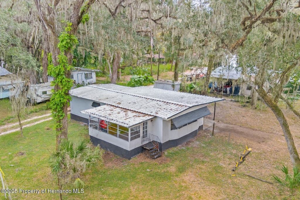Photo of 3617 Cr 406, Lake Panasoffkee, FL 33538 (MLS # W7881279)