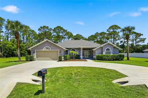 Photo of 62 Sentinel Trail, Palm Coast, FL 32164 (MLS # O6420342)