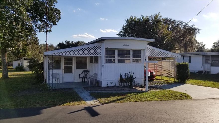 Upgraded single wide 1 Bedroom 1 Bathroom  mobile home in a desirable +55 community. Home is fully furnished with a recently upgraded bathroom featuring a walk in shower. Laundry has a newer stacked washer and dryer.  There is a new automated chair lift which lifts from the ground level Florida room up the two steps to the mobile home level. Tropical Park has many of the desirable features of park living like shuffleboard, clubhouse and its close to bus lines, shopping and restaurants.  Buyers must be approved by Tropical Park HOA.