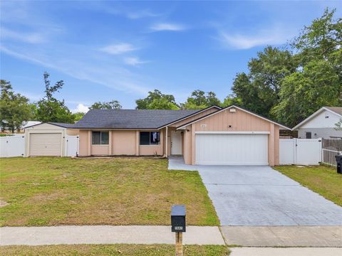 Photo of 7641 Compass Drive, Orlando, FL 32810 (MLS # O6406790)