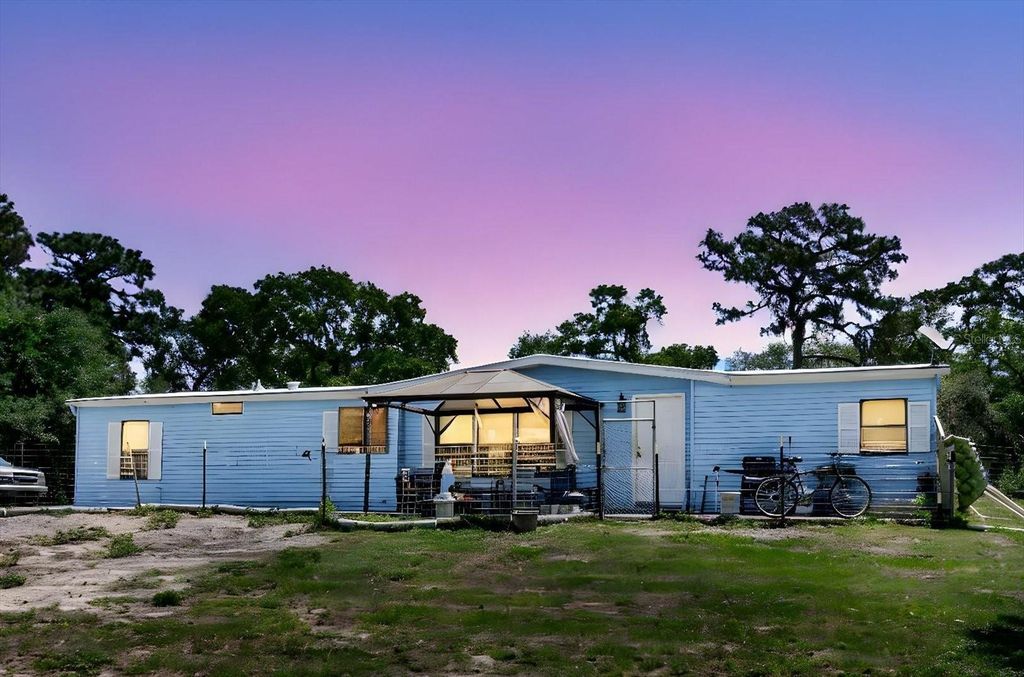 Photo of 13126 Hicks Road, Hudson, FL 34669 (MLS # TB8385056)