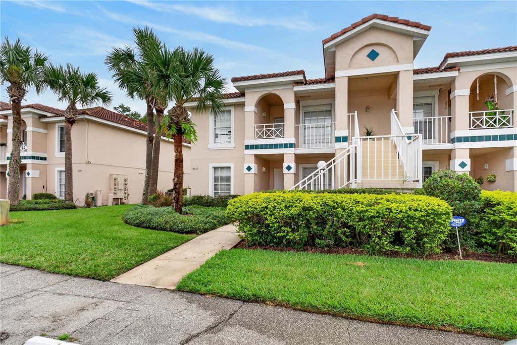 Photo of 13829 Timberland Drive #101, Orlando, FL 32824 (MLS # O6434059)