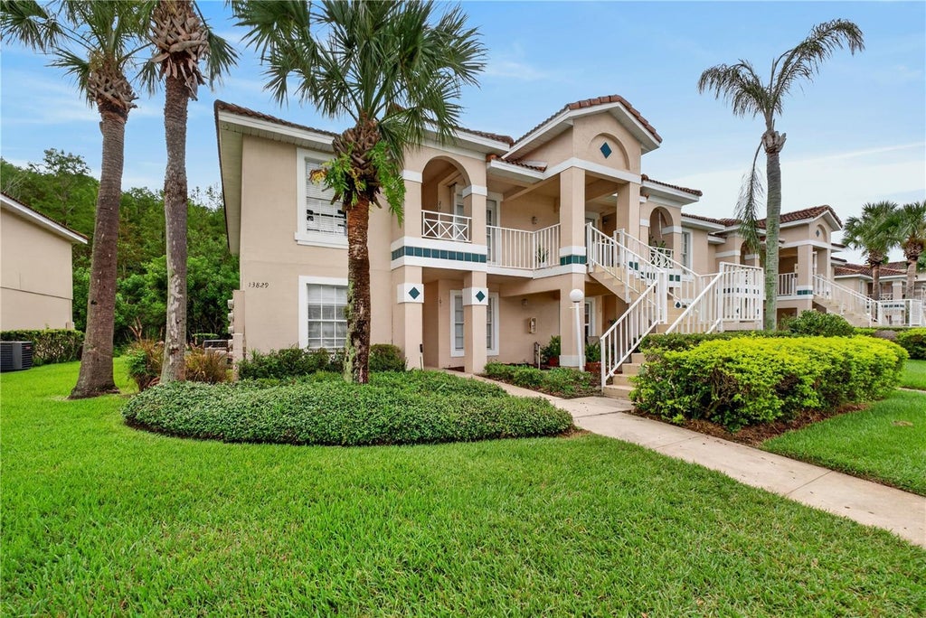 Photo of 13829 Timberland Drive #101, Orlando, FL 32824 (MLS # O6434059)