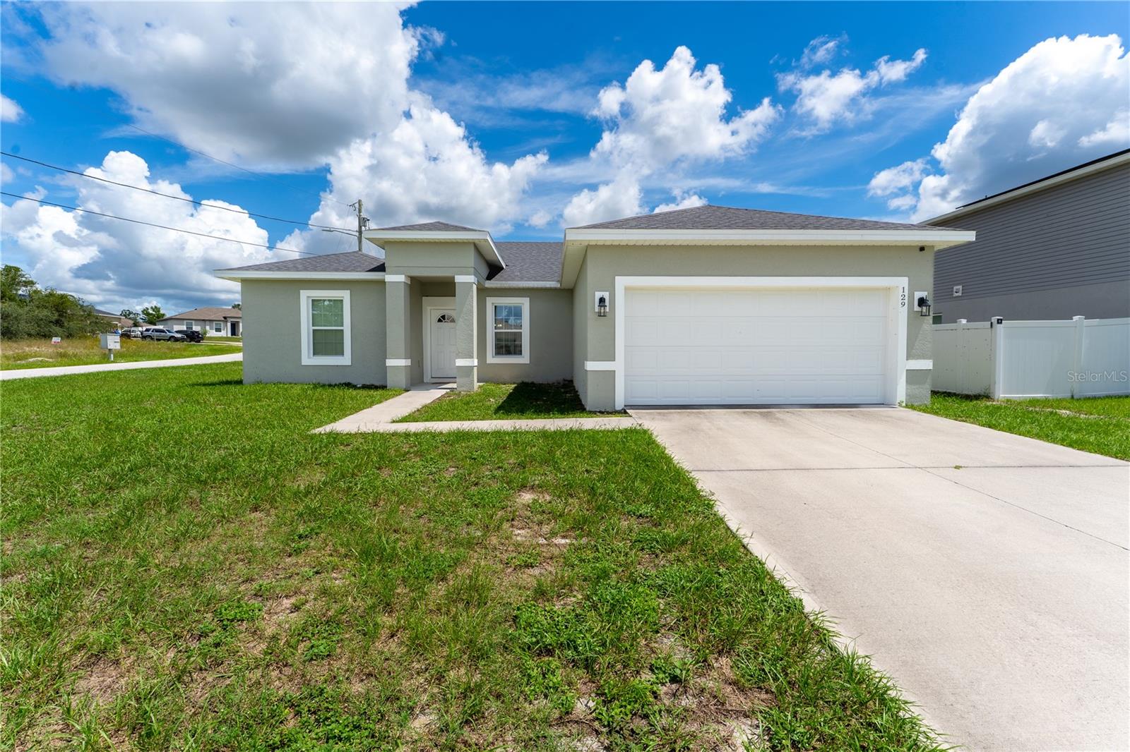 Welcome to this beautiful 4-bedroom, 2-bathroom home built in 2022, located in Poinciana! Offering 1,758 square feet of living space, this home features an open-concept layout perfect for modern living. A spacious kitchen that flows seamlessly into the living and dining areas, enjoy sleek tile flooring throughout. The primary primary bedroom includes a full en-suite bathroom with ample closet space. Whether you're entertaining or relaxing, this will-maintained home is move-in ready and waiting for you to make it your own!