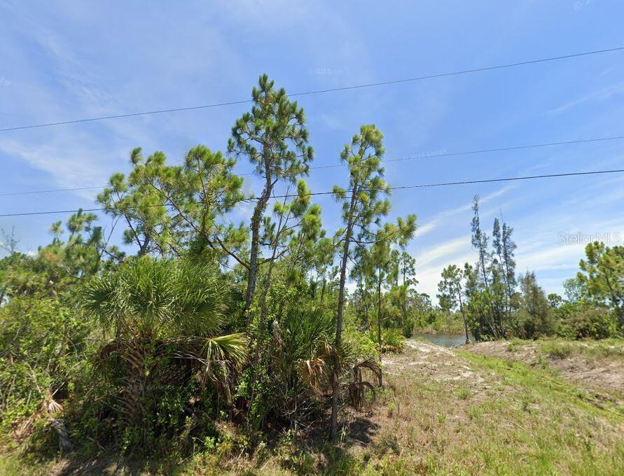 Waterfront paradise lots. Next lot 15189 Amsterdam Ave available for a double lot option. Each lot 80x125 in the waterfront. Vacant land to build your dream house. Minutes to golfing and fishing, boating and a short distance to beautiful beaches around. Fish and Boat right from your backyard. Close to Englewood Beach, Boca Grande . City water and sewer available. Don't miss the chance to create your own piece of paradise.