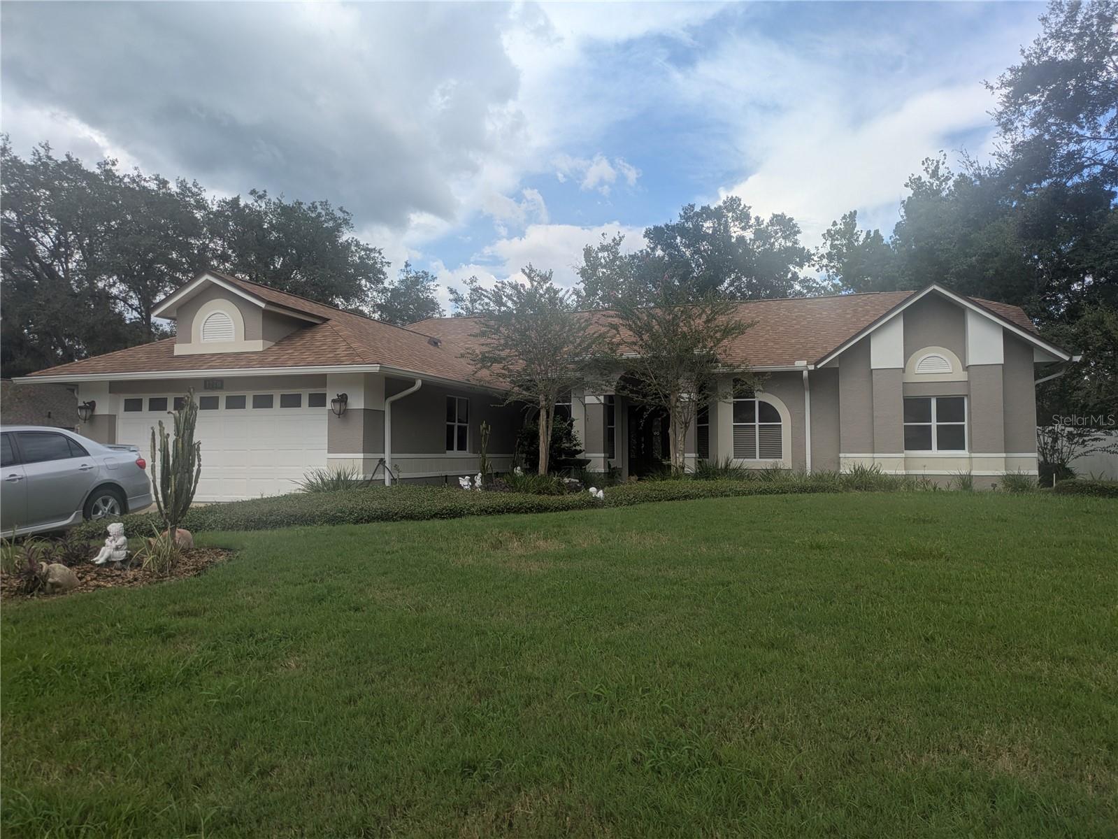 This Beautiful 3 bedroom, 2 bath home is your personal paradise minutes to restaurants and shopping! featuring a large private pool, a spacious screened-in patio perfect for entertaining, a firepit for the family to gather around, and a fully plumbed, powered, A/C she-shed for work or hobbies. The main living area is framed by two large French doors, offering a sweeping view of the pool and lush backyard, where multiple fruiting trees and plenty of open space create the perfect setting for gatherings. The master Suite has an organized walk-in closet, his and hers sink, and a gorgeously tiled shower with two showerheads.