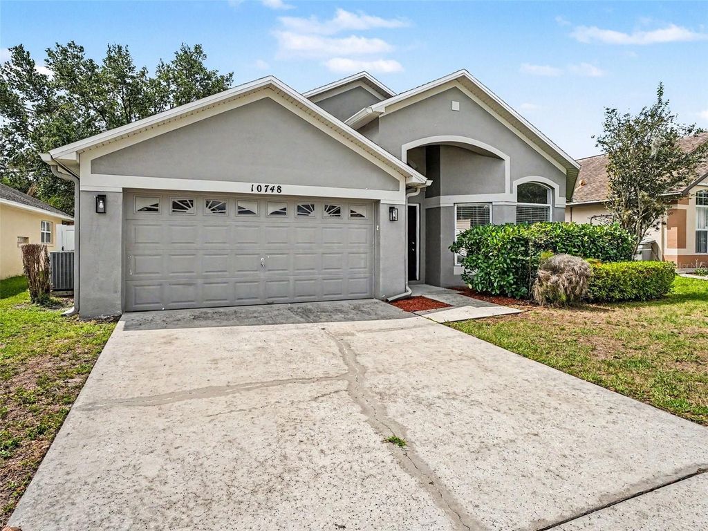 Photo of 10748 Flycast Circle, Orlando, FL 32825 (MLS # O6407407)