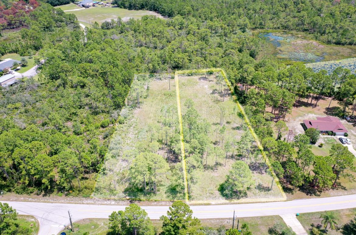 A Rare Slice of Florida Awaits You! PROPERTY HAS BEEN PARTIALLY CLEARED! Additional neighboring parcel available for purchase for a total of 2.04 acres- parcel number 811302010040.
Nestled in the heart of Deltona, this 1.02-acre parcel offers the perfect blend of natural serenity and development potential. It is a mix of cleared space and untouched Florida foliage and ready for your vision. The property invites you to imagine a peaceful homestead, a custom-built retreat, or even a savvy investment opportunity. Whether you're dreaming of a modern farmhouse with a wraparound porch, a minimalist home tucked among the trees, or simply a place to park your RV and enjoy weekend getaways, this land is your canvas. With utilities nearby and easy access to city services, development is straightforward and flexible. This property is just minutes from I-4, making commutes to Orlando or Daytona Beach a breeze. Nearby shopping, schools, and medical facilities allow convenience without sacrificing tranquility. Close to parks, lakes, and nature preserves—perfect for outdoor enthusiasts.