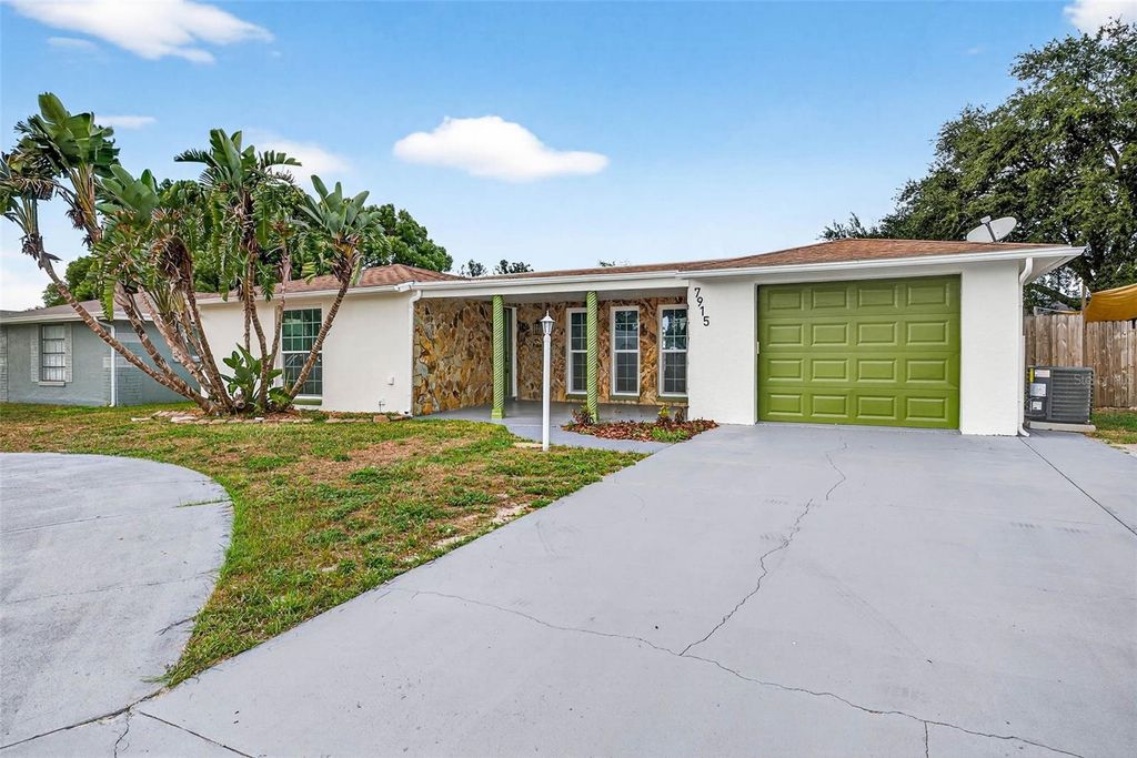 Photo of 7915 Ironbark Drive, Port Richey, FL 34668 (MLS # TB8435859)