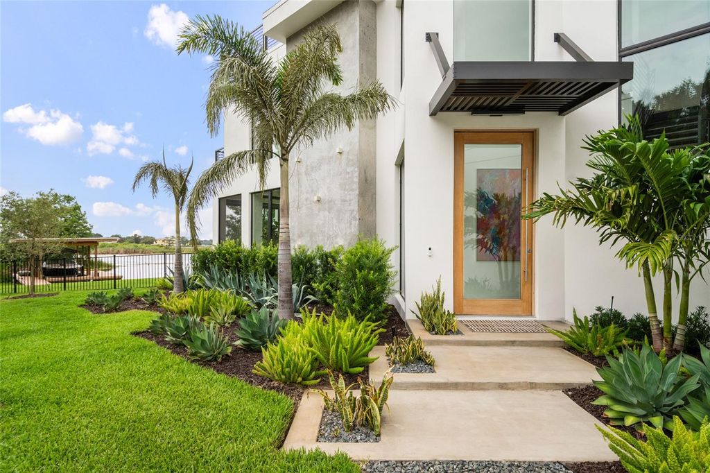 Photo of 9061 Ron Den Lane, Windermere, FL 34786 (MLS # O6417446)
