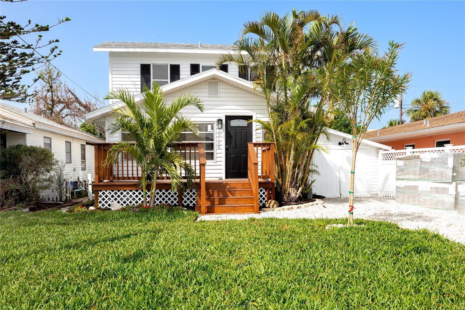 Welcome to your dream coastal home just a short stroll away from private access to Madeira Beach. This beautiful 2 story, 3 bedroom 2 bath beach bungalow has been fully remodeled with permits. Brand new kitchen appliances, pantry, and kitchen island for all your cooking needs. Enjoy the natural light throughout with lots of windows allowing you to enjoy the coastal breeze and smell of the ocean. Enjoy the view from the balcony or a barbecue down below on the deck. The backyard has an outdoor shower to rinse off after a day on the beach. Located near John's Pass Village, all the dining, shopping, excursions, and more for your convenience and entertainment. Schedule your showing today! Home is Available for Sale as well.