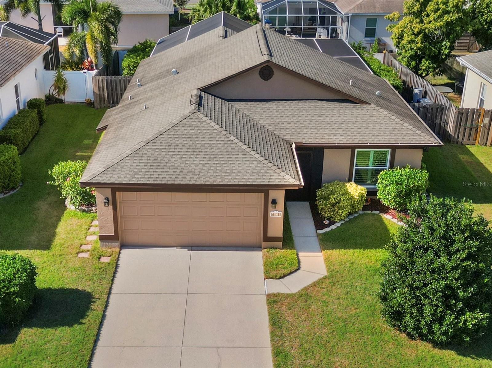 Step inside this fully upgraded 3-bedroom, 2-bath home and immediately see why it’s ready to be enjoyed from day one! With a recently remodeled kitchen, cohesive flooring throughout, and a split floor plan, this home blends modern style with Florida comfort perfectly. The primary bedroom features an ensuite bathroom and walk-in closet, while the converted garage offers a versatile heated and cooled space—ideal for a home office, workshop, gaming room, or laundry area— still leaving room to park.
The backyard is a true retreat—a spa-like, multi-layered pavered lanai and patio with a spa cascading into the heated pool, perfect for entertaining, relaxing, or soaking up the Florida sunshine. The screened lanai adds extra outdoor living space for year-round enjoyment.
Recent upgrades leave nothing to do: A/C (2025, transferable warranty), water heater (2022), roof (2018), exterior paint (2021), rescreened lanai (2024), newly tiled spa (2025), and all new kitchen appliances (stove 2025, convection microwave, dishwasher, fridge). Designer lighting, upgraded ceiling fans and hardware, smart thermostat, garage door opener, and hurricane-rated PGT windows and front door (2017–2022) round out the quality features from a trusted local Florida company known for superior craftsmanship.
The community amenities offer an ideal mix of recreation and relaxation: pool, tennis, pickleball, basketball, and volleyball in a No-CDD, low HOA neighborhood with easy access to I-75. Enjoy nearby dining and entertainment at Waterside Place, UTC Mall, and Main Street in Lakewood Ranch, explore the newly opened Mote Marine Aquarium, Popstroke Golf or make a quick trip to Costco and the newly opened Target for everyday convenience. The area’s stunning beaches—Bradenton Beach, Holmes Beach, and Anna Maria Island—are just 20 to 25 miles away, making it easy to spend the day along Florida’s Gulf Coast.
Situated outside a flood zone, this home isn’t just updated—it’s fully finished, beautifully maintained, and ready for you to start living your best Florida lifestyle!