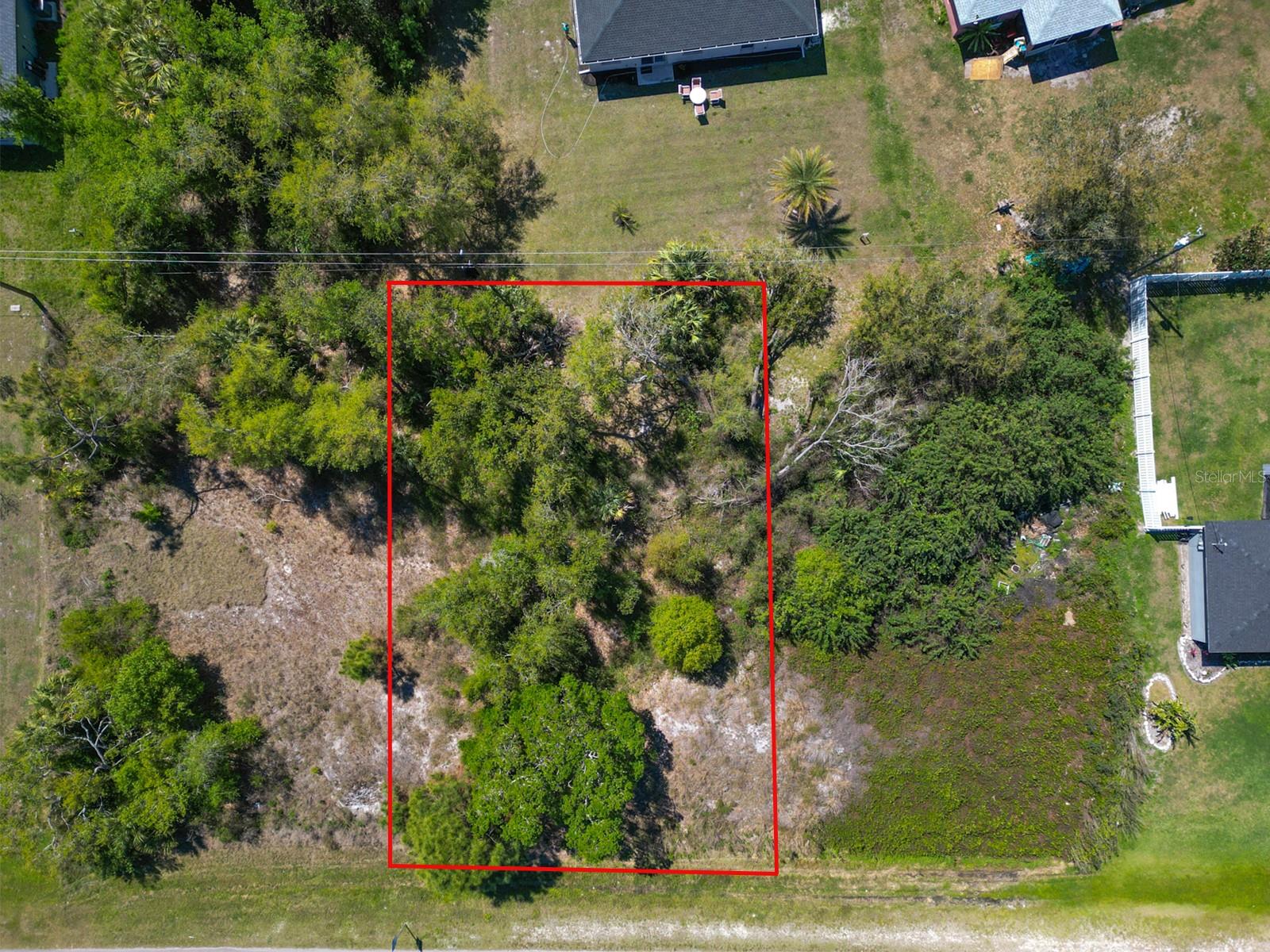 RARE VACANT LAND on Price Blvd available, just minutes from I-75, making trips to Sarasota, Venice, Port Charlotte, or even Naples quick and convenient. You’ll also be just a short drive from Wellen Park, a new community full of shops, dining, parks, walking trails, live entertainment, and the Atlanta Braves Spring Training stadium.The City of North Port continues to pop with new homes, schools, and businesses, which makes this the perfect time to secure your piece of land here in Sarasota County. Whether you are a home builder looking to build your MODEL HOME or if your looking just just build your DREAM HOME, don't stress as there are NO HOA restrictions, plus you’re close to Gulf beaches, golf courses, and beautiful nature preserves! Whether you’re dreaming of building your forever home or looking for a smart investment, this location checks all the boxes. And if you’d like assistance on the building process, our trusted custom home builder is available to walk you through every step and answer your questions!
