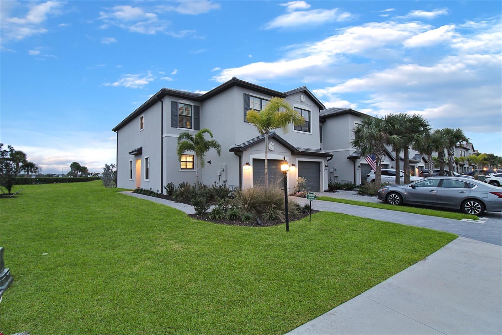 This fabulous townhouse in Lorraine Lakes has many great features. It is an end-unit, providing additional privacy and natural light. The community offers a resort-like atmosphere with amenities such as a pool, clubhouse, restaurant, game room, kid's park, workout rooms, and an indoor basketball court. The home has an open and inviting floor plan, featuring all gas appliances. There is an attached garage for convenience. The property also has a lanai that overlooks a scenic lake. The location is ideal, being near the new library, Premier Sports, and easy access to Route 70. It is also within close proximity to all the amenities and attractions of the Lakewood Ranch community. If you are interested in this townhouse, it is currently vacant and available for immediate move-in. The community is gated, so be sure to call ahead before visiting.