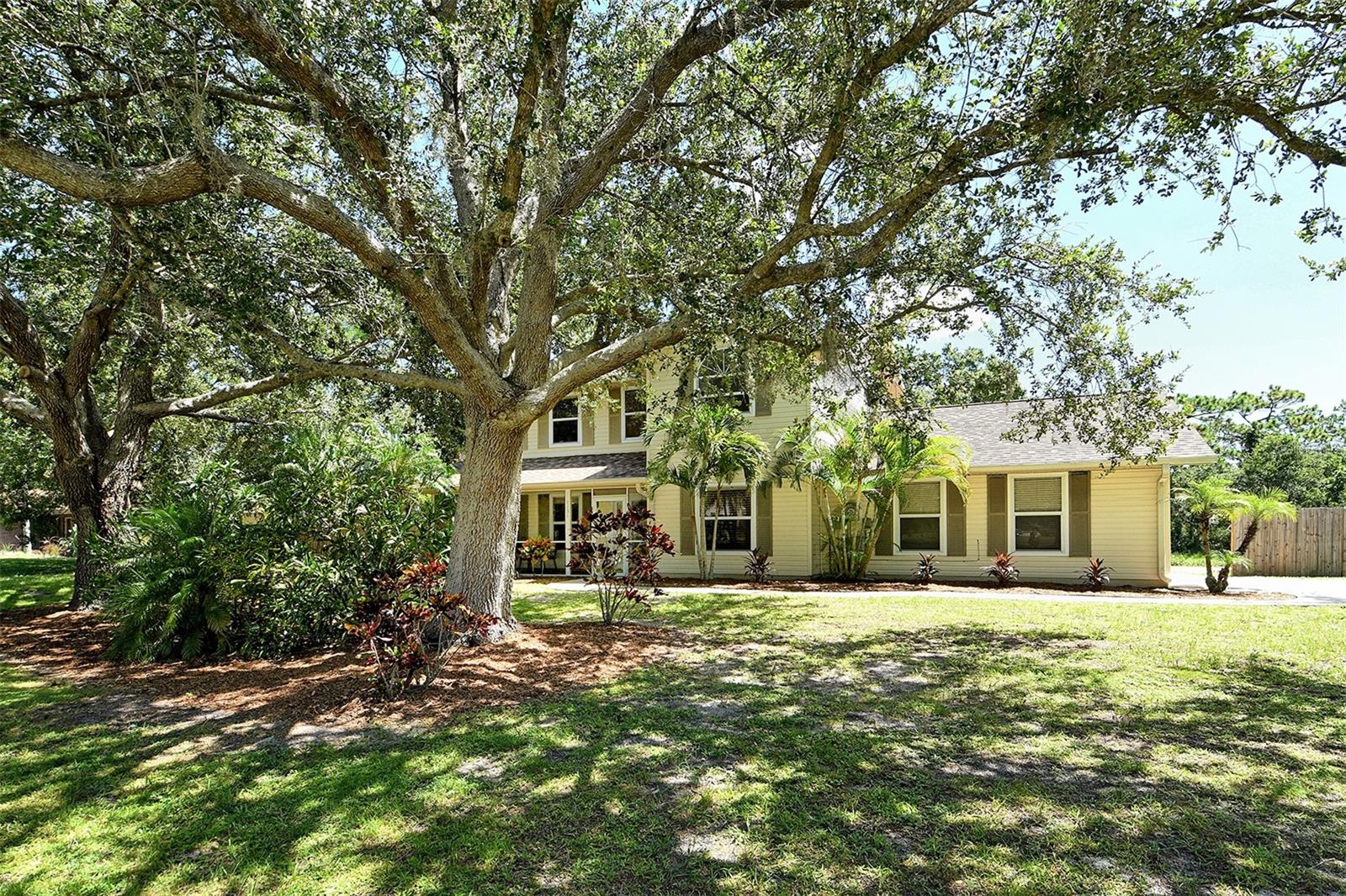 Welcome to your dream home in the highly sought-after Mill Creek Community! Situated on a 1.7 acre lot, this beautifully maintained 3-bedroom, 2.5-bath residence offers 2,076 sqft of thoughtfully designed living space across two floors. Enjoy the outdoor living and tranquil water views from the enclosed back porch, sunbathe on the deck, or gather around the firepit for cozy evenings. The spacious floor plan flows beautifully with natural light throughout and abundant storage space ideal for families and entertaining. Features include: New roof 2025 | Renovated kitchen - 2021 and new appliances in 2024 | Dual AC system – 2018 | wood-look tile flooring throughout the downstairs area | picturesque water views throughout the home and enough space to add a pool if you wish! This mature neighborhood has low HOA fees of $535 annually and no CDD fee! This home blends comfort, style, and location—you truly won’t be disappointed.