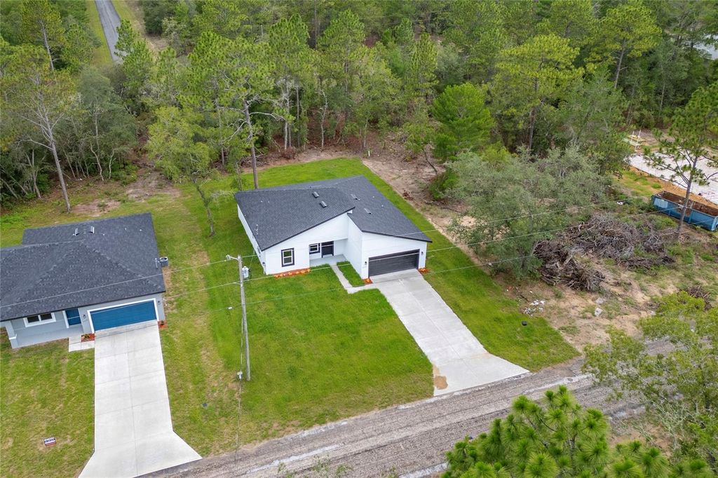 Photo of 9312 N Akola Way, Citrus Springs, FL 34434 (MLS # O6324773)