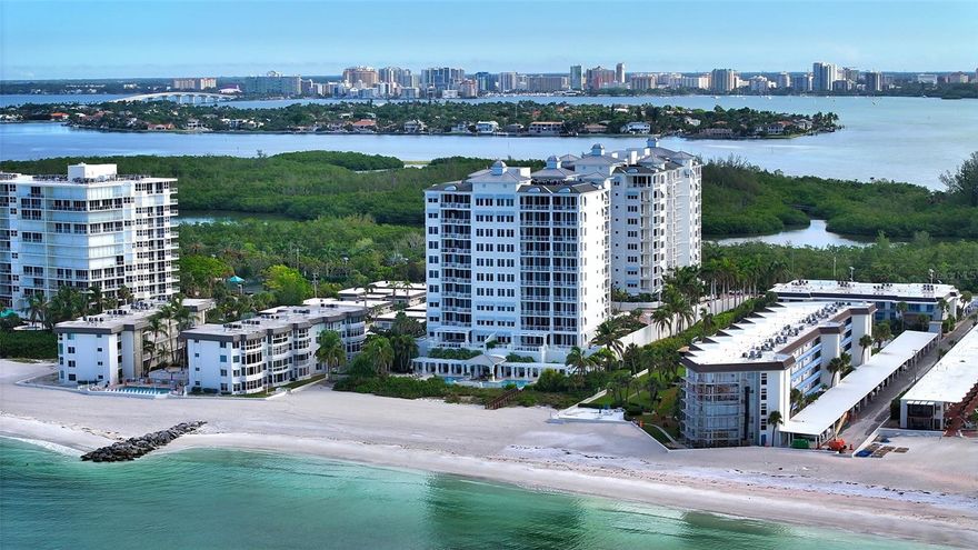 Introducing an Exceptional Beachfront Condo on Lido Key
The rarely available Cayman model in The Orchid Beach Club can become your beachfront bliss. Embrace the coastal lifestyle in a home that offers both luxury and comfort. 
This dream condo awaits in unit 301 ~ 4229 sq ft of living space and over 726 sq ft of terrace make this floorplan a coveted one.
Nestled on the pristine shores of Lido Key, this exquisite 3 bedroom, 4.5 bath beachfront property is everything you would want for luxury living. 
With expansive terraces that capture the breathtaking beauty of both the Gulf of Mexico to the west and the serene Sarasota Bay to the east, you can relish in the magic of both sunsets and sunrises while relaxing in your own home.
A private elevator whisks you effortlessly to your home.
The unit's open floor plan creates an inviting and seamless flow, with a grand salon and adjacent TV area providing a perfect space for relaxation. A separate dining area, harmoniously connected to the open kitchen, makes entertaining a breeze. The elegant lighting fixtures, including beautiful chandeliers, illuminate the space, accentuating the soaring ceilings that lend an air of grandeur.
The master bedroom suite is a true sanctuary, featuring a cozy den, his and her baths, his and her walk-in closets and a most spacious bedroom that looks out on the Gulf of Mexico.
Parking is a breeze with a spacious 2-car garage that provides plenty of space for storage, keeping your belongings organized and accessible.
Orchid Beach Club, a community that exemplifies luxury beachfront living and boasts a beautiful clubhouse. Here, you'll enjoy an array of amenities designed to enrich your coastal lifestyle, from a well-equipped exercise and fitness room to meeting and party rooms featuring a chef's kitchen, a library and a billiard/game room – perfect for hosting gatherings with friends and family. Beautifully appointed guest suites are available for your loved ones when they come to visit, ensuring their comfort and convenience.
The stunning pool area reminiscent of a private resort serves as a serene sanctuary for residents. Immerse yourself in the sparkling waters, soak up the Florida sun on the expansive pool deck, or unwind in the soothing spa ~ all while overlooking the Gulf of Mexico.
Minutes away from both Saint Armand’s Circle and downtown Sarasota, you'll find yourself immersed in a vibrant cultural scene, upscale shops, and world-class dining. 
This is more than a home; it's a lifestyle – an opportunity to embrace the serene beauty of Lido Key, to savor the luxury of Orchid Beach Club, and to enjoy  the vibrant culture of Sarasota. Make this beachfront masterpiece yours today and experience the pinnacle of coastal living.
