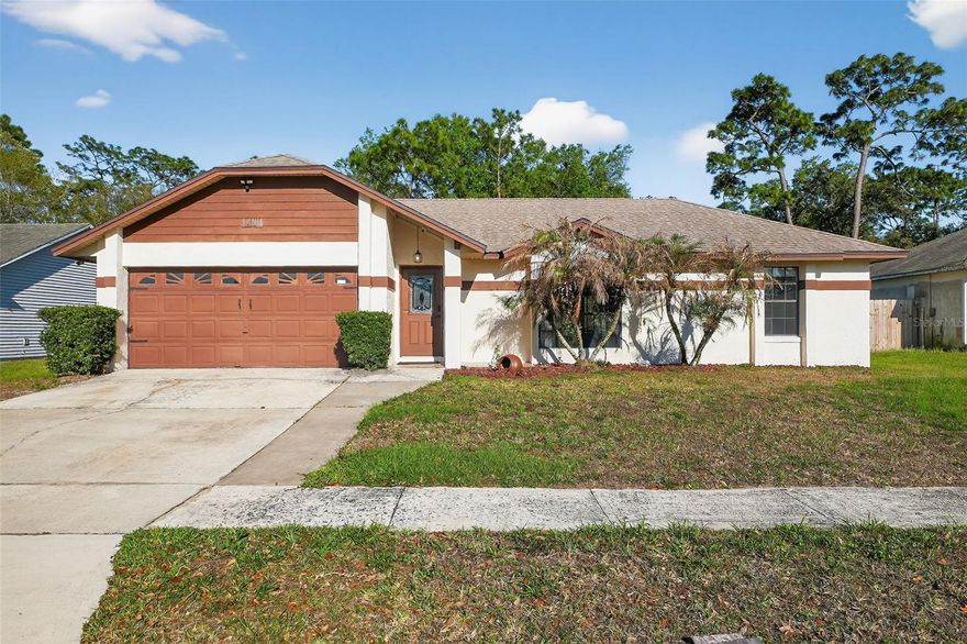 Check out this 5 bedroom 2 bath split plan Orlando home with an oversized two car garage, large lanai and a fenced in yard.  Nice wooded views in the rear from your gazebo-with chandelier! No HOA! Separate living room (with a large window that could be turned into a cozy window seat area), dining room and a family room too. This home has many different spaces for hanging out, working from home and entertaining. If you remember linen closets and medicine cabinets - and you miss them because they don't usually include them anymore - here's your chance to have some more of those handy storage areas. A gorgeous glass insert on the front door - allowing for light and beauty at the entrance.  Do you love to cook/bake?  Then you will love the double ovens - one is a convection oven. Thinking about adding a hot tub? There's room for that - and power already in place for it! Double sliding doors to the lanai - one from the family room, another from the dining area. The hall bath also has a door to the lanai - making for ease of access when entertaining - or when using the possible future hot tub-or pool- there's room for that as well!  Ask your Realtor about some great special financing available for this area too!