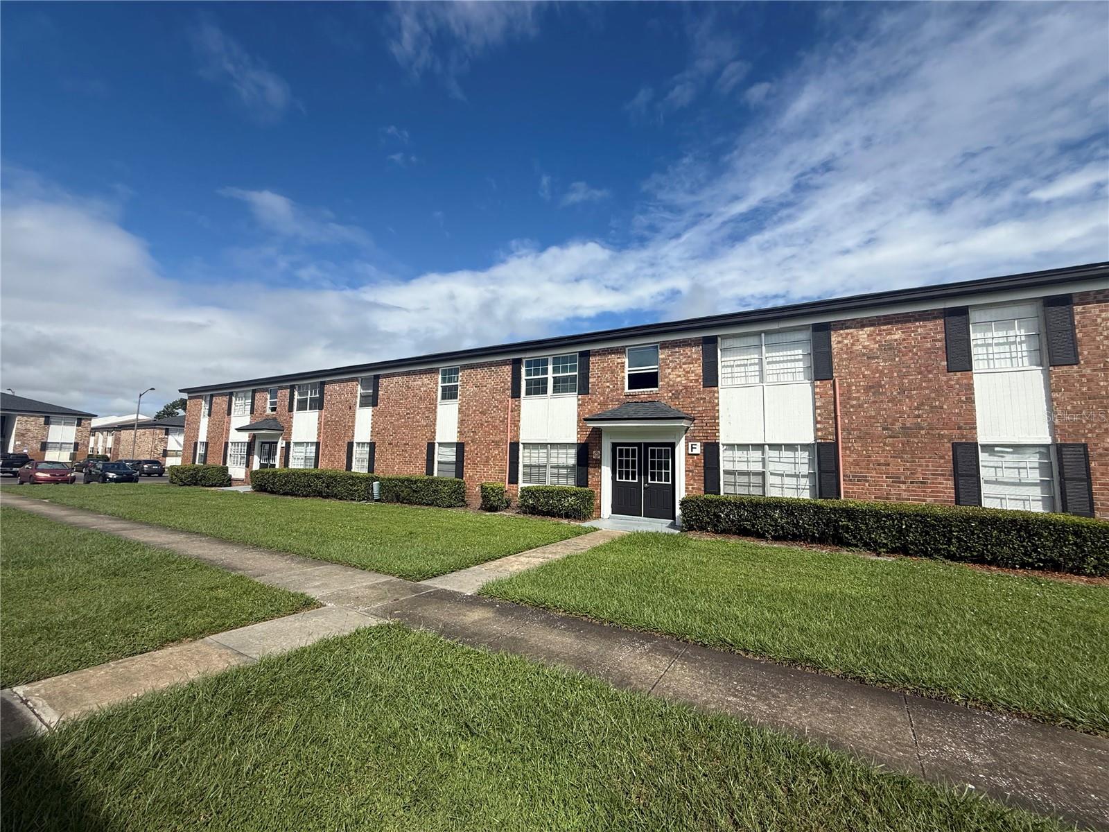 Spacious two-bedroom, first-floor condominium located in a highly desirable community just minutes from Orlando International Airport. The home features a generous formal living room upon entry, providing a comfortable space for relaxation or entertaining. The kitchen and dining area are situated at the rear of the home and open to a private balcony with access to the lower level. The kitchen and bathroom are original and ready for renovation, offering an excellent opportunity to add your personal touch and value. The primary bedroom features abundant natural light and ample closet space, while both balconies overlook peaceful garden views. This well-maintained community offers fantastic amenities including swimming pools, dog walking areas, on-site laundry facilities, a basketball court, and a picnic area. Conveniently located with a Lynx bus stop on-site and within walking distance to shops, restaurants, and major highways. HOA fees include water, pest control, and trash service. This property is ideal for homeowners or investors and is available for a quick move-in!