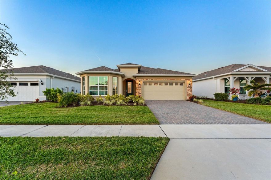$15K FLEX CASH for closing cost or discount! Sellers invested $130K in upgrades (list avail.). Lakefront living in Viera's premier 55+ comm, 15 min to beach, delivering exceptional value, design & lifestyle. A 30,000 SF clubhouse elevates your social calendar w/ restaurant, resort-style pool, pickleball, tennis & a state-of-the-art fitness ctr. This home impresses w/ stone façade, bay window & open plan. Inside: wood-look tile, Minka-Aire fans, crown molding, 5 1/4'' baseboards, faux-wood blinds, CAT6 wiring & gutters. Chef's kitchen shines w/ storage, white soft-close cabinets w/ pull-outs, built-in micro & oven, gas cooktop & Calacatta Gold quartz on all counters, incl. baths, plus a large island w/ pendants. Great rm feat. tray ceiling & 8ft doors. Owner's suite is a retreat, offering a spacious walk-in closet & a spa-like dual rain/std shower. Flr-to-ceiling tiled showers, comfort-height toilets, drop-zone bench & garage w/ 3 overhead racks complete this must-see home. Act now!