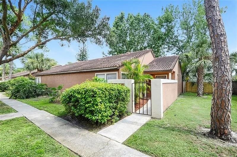 Welcome to this beautifully updated corner-unit condo in Winter Park featuring 2 bedrooms, 2 baths and a thoughtfully designed layout that maximizes space and comfort. Light and bright with plenty of windows, this home offers a spacious living room with vaulted ceilings, a cozy wood-burning fireplace, and a built-in bar—perfect for entertaining. The dining area flows easily into the kitchen, which is equipped with wood cabinets, granite countertops, stainless-steel appliances, and a breakfast bar for casual meals.
The primary suite boasts a large walk-in closet, dual sinks with granite counters, and updated cabinetry, while the additional bedroom offers ample space and comfort. Tile flooring runs throughout the main areas, with carpet in the bedrooms for a warm touch. An indoor laundry room with washer and dryer is included for your convenience.
Step outside to your private fenced patio and garden area, offering the perfect space to relax, grill, or entertain. Community amenities include a pool, fitness center, tennis court, playground, and duck pond, with HOA dues covering water and sewer.
Ideally located near Full Sail, UCF, Valencia, and Rollins College, with quick access to Lake Baldwin, Cady Way trails, OIA, downtown Orlando, and Park Avenue boutiques and dining. Zoned for highly rated Winter Park schools.
Welcome home—this one won’t last! Equal Housing Opportunity.
