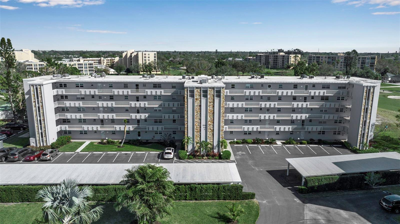 Welcome to your perfect slice of paradise in the desirable Ironwood community. This beautifully maintained 2-bedroom, 2-bath condo offers breathtaking views of the 10th fairway and comes fully furnished, ready for you to move in and enjoy the Florida lifestyle. The spacious open-concept living and dining area seamlessly connects to a screened and glass-enclosed lanai, perfect for savoring your morning coffee while watching the golfers. The primary bedroom features a walk-in closet, an additional closet for extra storage, and an en-suite bathroom with a stand-up shower. Ceramic tile and laminate flooring runs throughout the living spaces, kitchen, bedrooms, bathrooms, and lanai, offering easy maintenance and a cohesive look. The building includes an elevator for added convenience and a freshly painted exterior. For social gatherings, residents can enjoy the 5th-floor Sky Room, complete with panoramic views, and a library. Additional conveniences include a separate storage unit for seasonal items (on 4th floor) and an assigned carport (#36).
The community clubhouse, just a short walk away, features a heated swimming pool, bocce and shuffleboard courts, a fitness center, pool tables, a library, and a large gathering room with a kitchen for hosting events. Ironwood is a pay-as-you-play golf community, allowing you to enjoy golf at your leisure without mandatory fees. This is a 55+ building, with ownership requirements that include no rentals before two years of ownership, no dogs, and no trucks allowed. Ideally located, this condo places you minutes from the beautiful beaches of Anna Maria Island, a variety of restaurants, shopping centers, medical facilities, and offers easy access to I-75, Sarasota-Bradenton International Airport, and Tampa International Airport. Don’t miss the chance to own this move-in-ready condo with stunning golf course views in one of Bradenton's most sought-after communities. Schedule your private tour today!