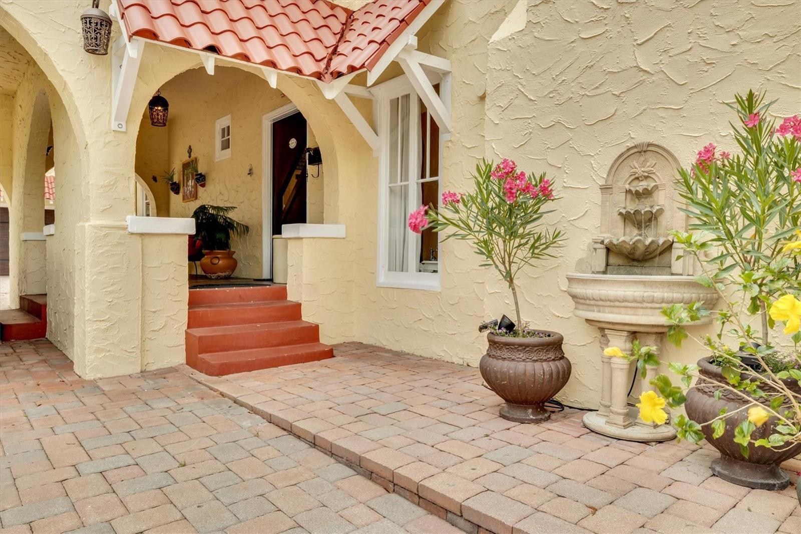 Aren’t You Tired of Living in a Gray World? Step Into Living Color. Say goodbye to the ordinary and hello to a home that radiates warmth, charm, and timeless beauty. This stunning Mediterranean-style estate isn't just a place to live—it’s a lifestyle. With its sun-kissed stucco exterior, red tile roofing, lush landscaping, and inviting arched entryway, every inch of this property feels like a dream escape. Imagine sipping your morning coffee sitting by the pool. Picture evenings in your spacious home filled with character, personality, and architectural detail you simply won't find in modern cookie-cutter builds. Complete with a generous driveway, a two-car garage with attached ADU, this home offers space, privacy, and style in equal measure. Why settle for dull and drab when you can live in full color? Located near Lake Hollingsworth, Downtown Lakeland, and golf courses. Schedule your tour today! (*Chevy C20 not included.)