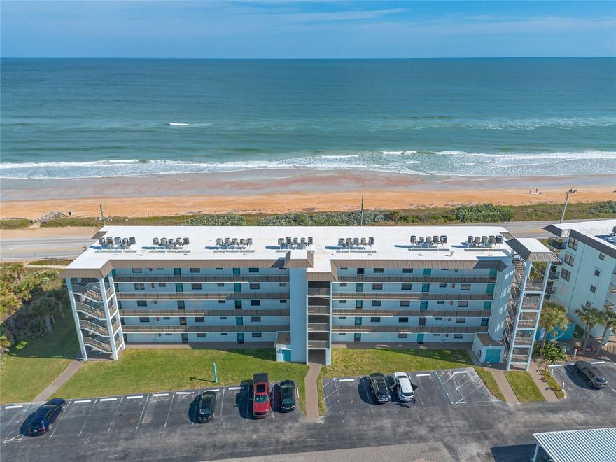 Experience coastal living! Enjoy stunning ocean views while drinking your morning coffee from your private balcony. This 2 bedroom 2 bathroom unit includes a spacious layout, tile flooring, in-unit laundry, and newer HVAC system. Dive into the sparkling in-ground community pool or take a walk on the no-drive beach just steps away with a convenient boardwalk right across A1A. Pet-friendly and approved for short-term (minimum 30-day) rentals! The HOA covers internet, cable, garbage, sewer, maintenance of the grounds, building and pool. Whether you’re seeking a full-time beachfront home, a weekend escape, or a reliable investment, this condo offers the relaxed coastal lifestyle you’ve been dreaming of.