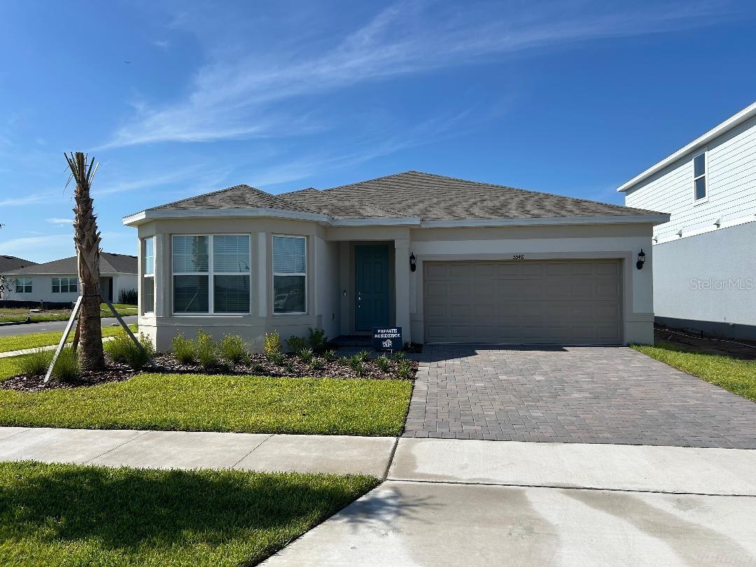 Stunning one-story Modern Home in the New Bridgewalk Community. This magnificent one-story home features a modern design – high ceilings, high top doors in the entire house, AC new technology for el. saving, stylish kitchen with elegant quartz countertops, ceramic backsplash, upgraded cabinetry, stainless steel appliances, Washer and Dryer, video doorbell, tiles throughout the entire property, covered porch, and a center island that opens to the main living space, making it ideal for gatherings or relaxed family nights. The thoughtfully designed floor plan offers plenty of space for comfortable family living. Located in Bridgewalk, a brand-new boating master-planned community in St. Cloud, FL, this home is less than 10 minutes from Lake Nona’s Medical City. Amenities include a resort-style swimming pool & spa, fitness center, volleyball & basketball court, playground, Tennis-pic ball/paddle ball, paths for walking and jogging, tot lot, dog park, private clubhouse, private boat ramp and dock with gazebo on Springhead Pond, four boat and jet ski slips and public boat ramp on Lake Ajay. Bridgewalk is just south of Lake Nona. This community is conveniently located in Lake Nona, Medical City, USTA National Campus, UCF Campus, Valencia Collage, KPMG and Orlando International Airport, Orlando areas and great access to Shopping, Restaurants, 417 and 528. Boxi Park Entertainment and Lake Nona Town Center are 10 minutes away. Elementary, Middle and High School are all A graded schools. Monthly exterior past control is included in the rent. Schedule a private showing.