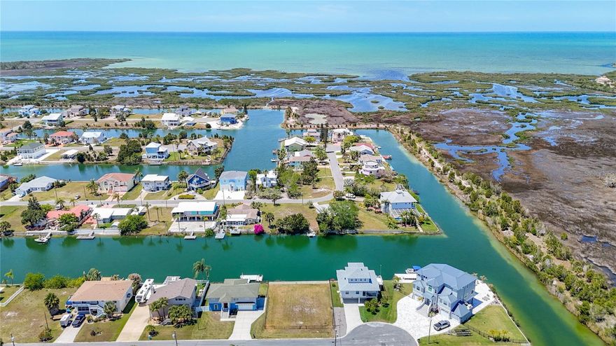 Prime Deep-Water Lot, with Indirect Access to the Gulf via Boatlift | West-Facing Sunsets | Cleared with Seawall Cap and Walkway In Place!
Experience the pinnacle of Gulf-coast living in this the much sought-after boating community of Hernando Beach. This oversized waterfront lot offers the perfect canvas for your custom coastal estate.
Positioned with ideal Western exposure, your future back porch is perfectly situated for world-class Florida sunsets every single night. Whether you’re fishing from your private dock or exploring the Gulf, this is where your vacation life becomes your everyday life.
With new luxury construction booming in the immediate area, now is the time to secure one of the few, premier western facing lots left in the neighborhood. Don't just dream of the waterfront lifestyle—build it here. Schedule your site visit today!