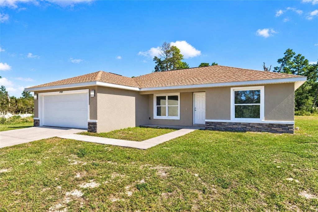 Photo of 17399 SW 25th Circle, Ocala, FL 34473 (MLS # OM734592)