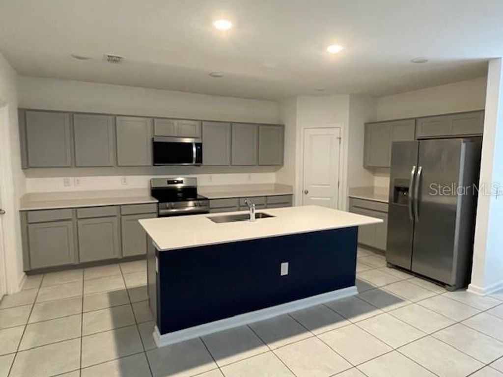 Photo of 725 Reggie Road, Winter Haven, FL 33884 (MLS # O6378638)