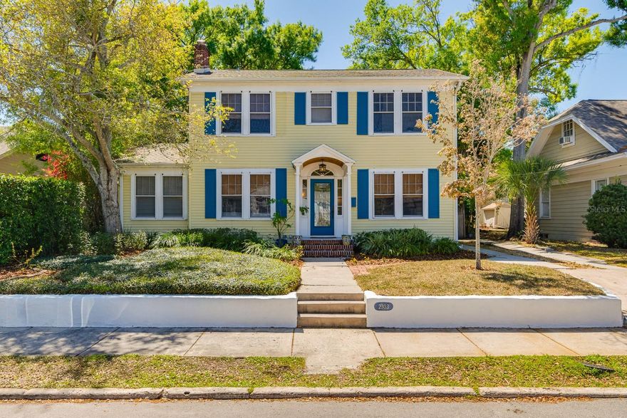 Historic 1925 Colonial Revival just steps to Bayshore's waterfront while located on a high elevation lot. Relax in the tropical backyard with heated pool, outdoor shower, pergola, deck, and tranquil fishpond. This updated 4-bedroom, 3-bath, 2-car garage home blends timeless character with modern comfort. Inside this sunlit layout are original hardwood floors, plaster walls and a cozy wood-burning fireplace. The renovated kitchen (2023) features all-wood cabinetry, quartz countertops, a walk-in pantry, and plenty of space to gather. The serene primary suite includes a walk-in closet and spa-style bath with soaking tub, walk-in shower, and custom teak vanities. Three additional bedrooms offer flexibility for family, guests, or a home office. Upgrades include a new roof with hurricane clips (2023) and new AC and new Electric panel (2025). Located by the Gasparilla parade route and just steps from South Tampa’s best dining, shopping, and scenic walks including Bayshore’s waterfront parkway—this home offers style, comfort, and unbeatable convenience. Zoned for top-rated schools—Mitchell, Wilson, and Plant.
