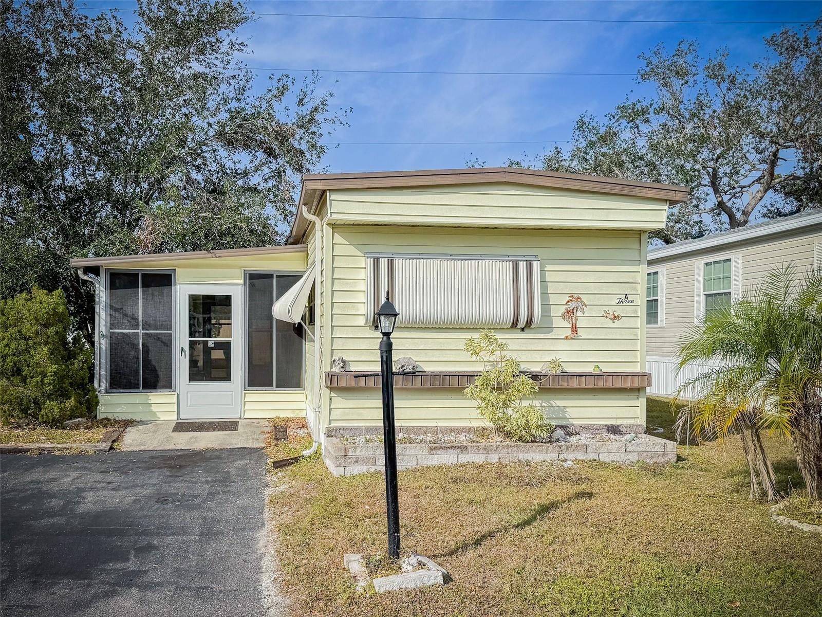 Cute 2 bedroom 2 bath is ready to move into. Comes partially furnished for buyers convenience. The attractive living area is laminate flooring throughout. The lanai is very spacious and airy. Westwinds Community gives you a peaceful feeling as you tour the neighborhood. Friendly neighbors will immediately make you feel at home and EVEN ALLOWS 2 SMALL PETS. Numerous social activities give you a chance to meet your new friends and neighbors. With their fun scheduled activities of Dinners, and Community Trips. Lunches, Card games, Shuffleboard, Boccie Ball, Billiards & Cards, Play Horseshoes, Large Heated Community pool & Hot Tub. Westwinds offer Storage space for RV's and boats with special pricing for their Residents. Come see this home today and make it yours.