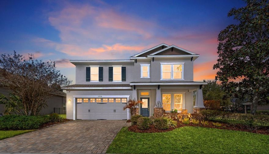 One or more photo(s) has been virtually staged. Welcome to Starling at FishHawk Ranch, where location, lifestyle, and convenience come together beautifully. Ideally positioned on a desirable corner lot just a 2-minute walk to the Starling clubhouse and resort-style pool, and only a 5-minute walk to the tennis courts, this meticulously maintained two-story home offers 2,602 square feet of thoughtfully designed living space with 4 bedrooms, 2.5 baths, a spacious loft/flex area, and a 2-car garage.

From the moment you arrive, you’ll notice the home’s exceptional curb appeal with fresh landscaping and inviting presence. Step inside to soaring volume ceilings, crown molding, modern fixtures, and stylish paint tones. Rich wood and tile flooring flow throughout the main level, complemented by abundant natural light streaming through oversized windows.

The chef’s kitchen is the heart of the home, featuring sleek cabinetry, a large center island with seating, stainless steel appliances, recessed lighting, and a generous walk-in pantry perfect for both everyday living and entertaining.

Upstairs, the spacious primary suite offers a true retreat with room for oversized furniture and a spa-like bath complete with dual vanities, soaking tub, glass-enclosed shower, and a large walk-in closet. Secondary bedrooms are all generously sized with ample closet space, and the versatile loft provides the perfect flex space for a media room, playroom, or home office.

Enjoy Florida living at its best by opening the French doors to your screened brick-paver patio with outdoor grill setup, ideal for entertaining. The fully fenced backyard offers plenty of room for play, pets, or future outdoor enhancements. Additional upgrades include a recently installed tankless water heater.

The standout feature of this home is its unbeatable walkable location — just steps from the Starling clubhouse, two resort pools, parks, tennis courts, and playgrounds. Residents of FishHawk Ranch enjoy top-rated schools and world-class amenities including over 30 miles of trails, multiple resort-style pools, fitness centers, tennis and basketball courts, sports complex, dog parks, and vibrant community events.

All of this while being conveniently located near shopping, dining, medical facilities, and major commuter routes to Tampa, MacDill AFB, and surrounding areas.

Homes in this location within Starling rarely come available — schedule your private showing today.