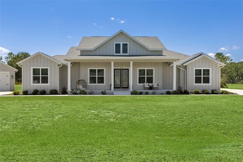 Photo of 8408 Woodleaf Boulevard, Wesley Chapel, FL 33544 (MLS # TB8529679)