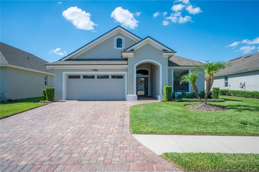 Welcome to effortless Florida living in the highly sought-after 55+ gated community of Lake James. This beautifully maintained 2019 Ernie White “Gibson” model offers 2 bedrooms, 2 bathrooms, a dedicated office/flex space, and nearly 2,000 square feet of thoughtfully designed living space.
From the moment you arrive, you’ll notice the upgraded curb appeal with paver driveway, manicured landscaping, and elegant architectural details. Inside, the home features soaring coffered ceilings, crown molding, an open-concept floor plan, and abundant natural light throughout. The spacious kitchen is designed for both entertaining and everyday living with quartz countertops, solid wood cabinetry, stainless steel appliances including a double oven with convection feature, a large island, pantry storage with wood shelving, and seamless flow into the dining and living areas.
The private primary suite is a true retreat featuring a large walk-in closet with custom shelving and an upscale en-suite bath complete with dual vanities, 2 linen closets, quartz counters, and a beautifully tiled walk-in shower. Guests will appreciate the split-bedroom layout that provides comfort and privacy, while the dedicated office with French doors creates the perfect work-from-home space or optional third bedroom conversion. The laundry room features built in cabinets, counter, and sink, for added convenience.
Step outside to enjoy the oversized screened lanai overlooking lush landscaping, creating a peaceful outdoor setting ideal for morning coffee or evening relaxation. Additional upgrades include tile flooring throughout the main living areas, recessed lighting, ceiling fans, indoor laundry with utility sink, and a spacious two-car garage with extensive shelving for added storage.
Lake James residents enjoy resort-style amenities including a community pool, clubhouse atmosphere, cable, internet, and maintenance services all included through the HOA for low-maintenance living. Conveniently located near shopping, dining, medical facilities, and major highways, this home offers the perfect blend of comfort, convenience, and upscale active living.
Tons of new updates including Water softener added in 2023, pavers treated / sealant applied in 2023, landscaping updated in 2025, exterior and one bedroom painted in 2026.
Move-in ready and impeccably cared for — this is the Florida lifestyle you’ve been waiting for.