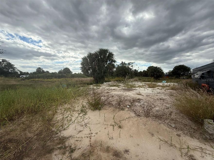 Beautiful 1.25-acre cleared lot featuring a peaceful pond, located in the desirable Prairie area of Okeechobee. This property is ready for your dream home, mobile home, or weekend getaway. Enjoy wide-open country views and plenty of room for animals, gardens, or recreational toys. The land offers easy access and a serene setting, ideal for those seeking privacy and space. No HOA and agricultural zoning allow flexibility for rural living. Whether you’re looking to build, invest, or escape the city, this scenic property with its charming pond provides endless possibilities.