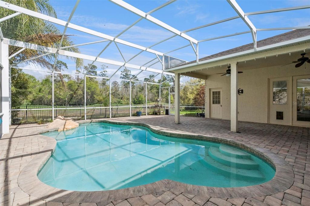 Photo of 2541 Teton Stone Run, Orlando, FL 32828 (MLS # O6392272)