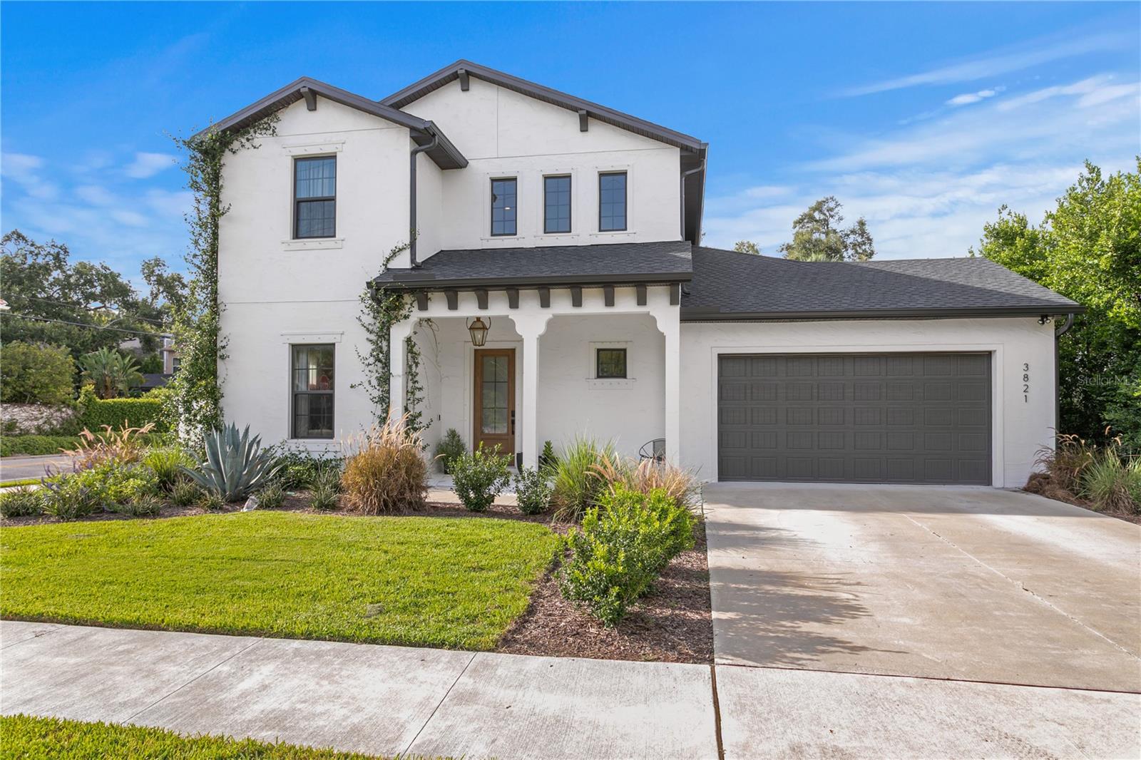 Welcome to your serene luxury retreat in the heart of South Tampa! Built in 2022, this four-bedroom, three-bathroom, mostly two-story block home spares no attention to detail. Located in the coveted Virginia Park neighborhood, just moments from Downtown Tampa, Tampa International Airport, Hyde Park, and the vibrant SOHO district, offering endless dining, shopping, and entertainment options. Featuring one bedroom on the first level, a saltwater pool, a private gym with AC, a den/office, a loft, and plenty of yard on a 70x120 lot. When entering the almost 3,200 sqft home, you are greeted with beautiful engineered hardwood floors and a stunning open concept. The first floor features a den/office combo upon entry, a mailroom, plenty of storage, and a full bathroom adjacent to the first-floor bedroom. The kitchen is a true highlight, featuring a breakfast bar, walk-in pantry, top-of-the-line stainless steel cafe appliances, natural gas cooktop, sleek quartz countertops, floor-to-ceiling tile incorporated into the stunning hood, and custom cabinetry and shelving, perfect for preparing family meals or hosting guests. Living room seating is abundant, even including a built-in cozy nook for additional seating. Enjoy a comfortable living experience with a den that can be used as a home office or extra living. Upstairs boasts the primary bedroom, central loft space, laundry, and two additional bedrooms. One bedroom is currently used as an office, but easily becomes an inviting bedroom. Loft space provides a playroom or additional flex space. The layout of the primary bedroom truly creates a one-of-a-kind oasis, with the laundry connected to the hall and the primary bathroom. The primary bathroom has floor-to-ceiling natural-tone tile, a rainfall showerhead, a dual vanity, and a freestanding bathtub. The Florida lifestyle was taken into consideration when designing the backyard. Travertine pavers create a spacious lounge area around the saltwater pool with a sun shelf. A gym with a separate entrance provides a private air-conditioned space to maintain a healthy lifestyle in the comfort of your own home year-round. Arrange your private preview today!