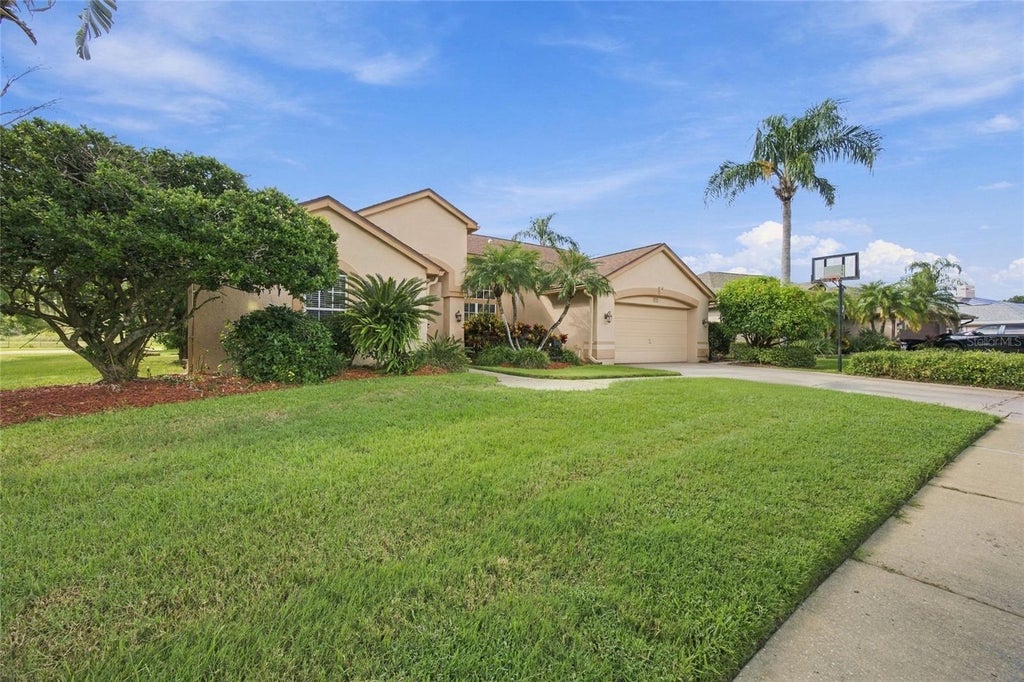 Photo of 878 Centerwood Drive, Tarpon Springs, FL 34688 (MLS # TB8550719)
