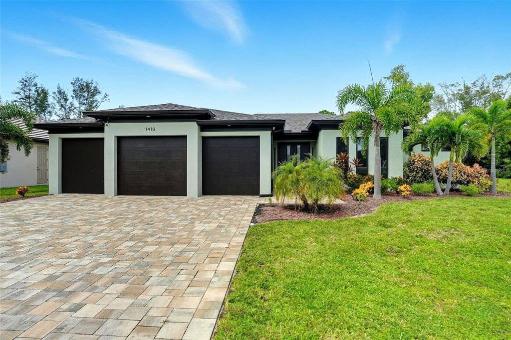 Photo of 1418 SW 1st Place, Cape Coral, FL 33991 (MLS # A4664924)