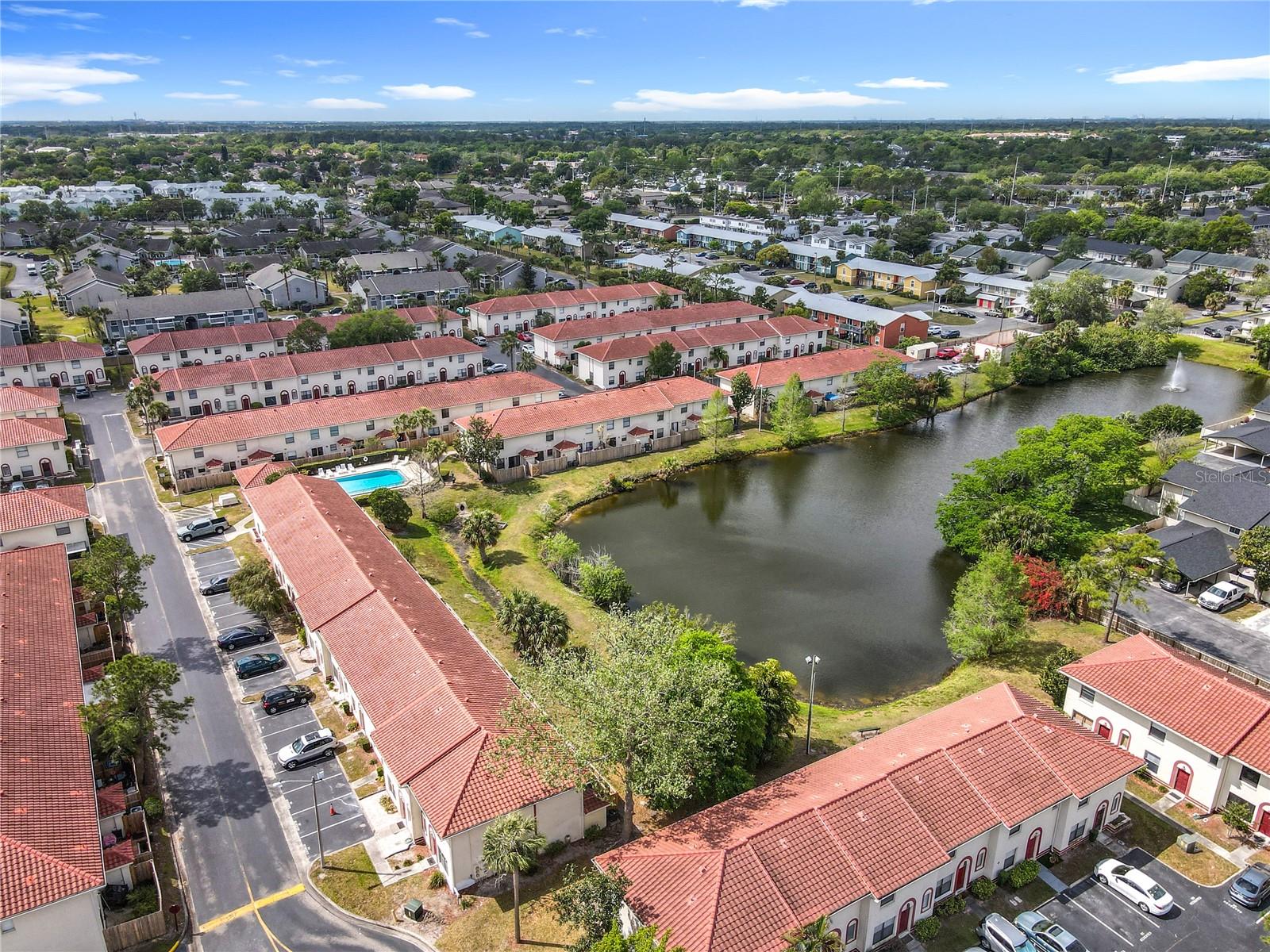 Beautiful, remodeled townhome in East Orlando. This unit has 2 bedrooms and 2 1/2 bathrooms. New flooring, paint and fixtures throughout. New kitchen updates include, NEW wood cabinets, stone counter tops, new appliances, new flooring and fixtures. This unit near the front and by the pool. New Electric panel and AC. This community also offers 2 pools, a hot tub, lawn care, outside pest control, roof, building insurance, dog walking area, etc. Reserved parking & plenty of guest parking. Brand new Tile Roof in the entire community replaced in 2021. Hidden Creek is within 15 minutes from SR408, SR528, University of Central Florida (UCF), Valencia Community College. Downtown Orlando and International Airport (MCO)