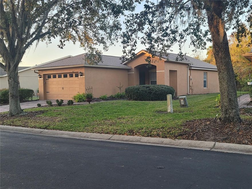 This 2 bedroom, 2 bath CBS Chardonnay model is nestled in a quiet street with a conservation in the rear. Home flooring is tile and laminate throughout. Kitchen has a good size pantry, the cabinets have been painted, countertops are Epoxy, comes with all kitchen appliances, plus washer and dryer, and water softener system in the garage (own). A nice screened-in lanai in the front to relax, read a book, or just have your morning coffee. Home has a breakfast bar and eat-in kitchen, overlooking the conservation in the rear. Just steps away from one of 14 pools in the community. The roof was replaced in 2020, home was painted inside and out same year.  Solivita offers an array of amenities, from 2 PGA 18-hole championship golf courses, 2 state-of-the-art Amenity Centers, 14 pools, 3 restaurants, tennis courts, pickleball courts, shuffleboard, bocce ball, Arts & Crafts Gallery, Billiards Gallery, two state-of-the-art fitness centers, a huge ballroom, a softball field, a community clubhouse, an indoor walking track, and more. Solivita is a 55+ community with 24-hour guarded security gates and over 200 clubs to join. The HOA fees cover landscape maintenance, amenities, cable TV and fiber-optic internet and security. Solivita is located across the street from the HCA Poinciana Hospital and a medical office building, in addition to the newly built Poinciana Lakes Plaza with an assortment of stores, restaurants, and more. Solivita is not only a place, it's a lifestyle!