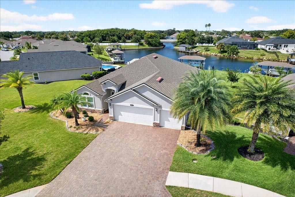 Photo of 50 Country Club Harbor Circle, Palm Coast, FL 32137 (MLS # FC312325)