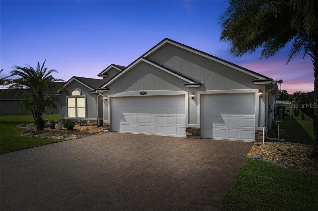 Photo of 50 Country Club Harbor Circle, Palm Coast, FL 32137 (MLS # FC312325)