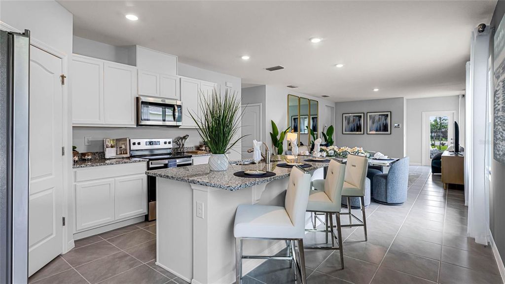 Photo of 10591 Gentle Rain Drive, Land O Lakes, FL 34638 (MLS # TB8432161)