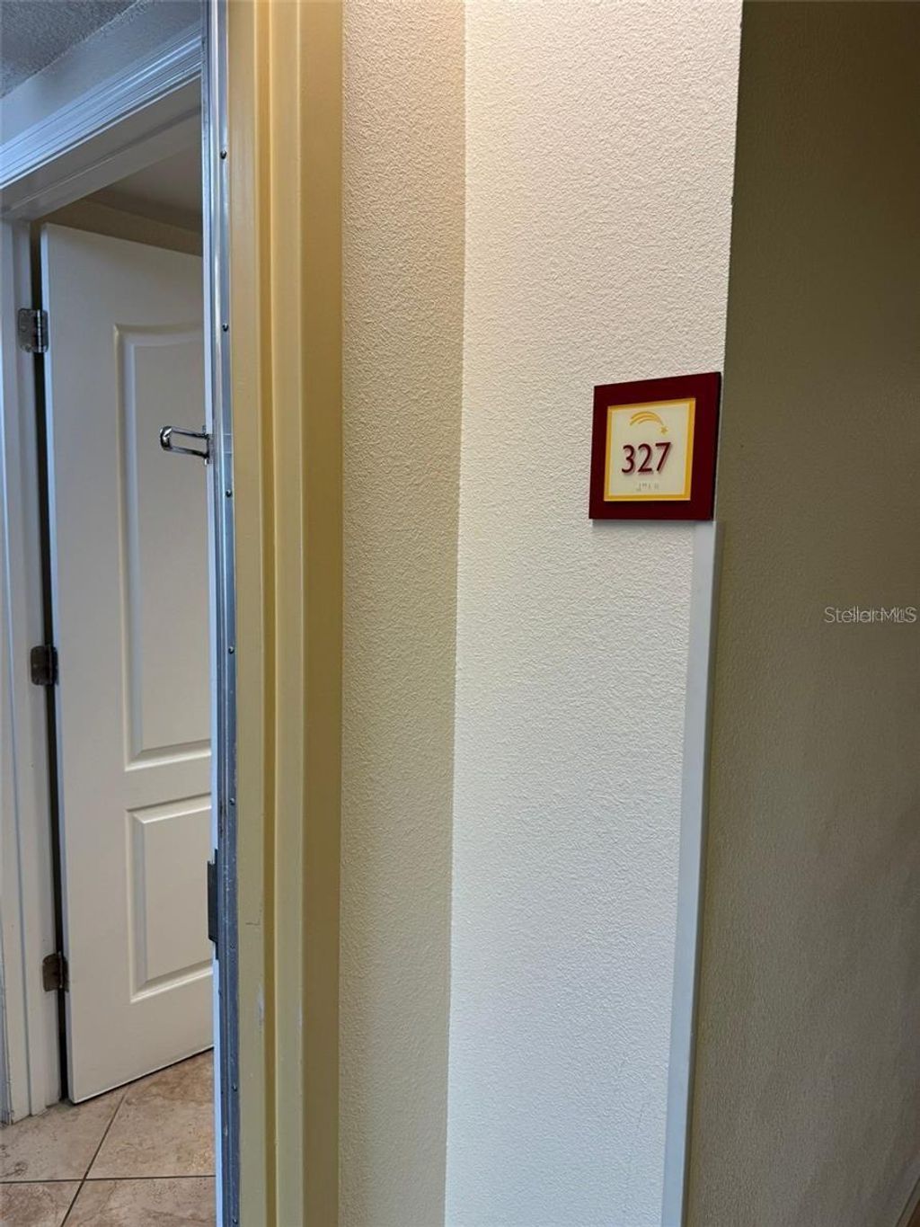 Photo of 3000 Maingate Lane #327, Kissimmee, FL 34747 (MLS # O6349076)