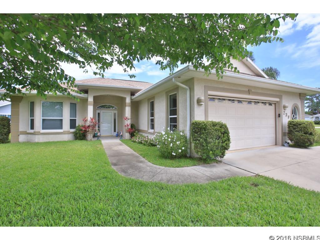 Under contract taking backups. First time on the market, 2001 concrete block custom built home with great waterfront location on lovely pond. Split bedroom plan, high ceilings, open floor plan and large master suite make this a great family home. Granite counters in kitchen, large pantry, interior A/C laundry room. Natural gas to furnace, water heater and BBQ. New wind-rated windows. Front bedroom features large bay window and French doors that open up to living room, would make nice den. Florida room overlooks pond and large side yard. Oversized garage is extra deep and wide and has electric screen door. Nestled between two golf courses and centrally located in golf community that is close to everything, minutes to shopping, dining and the beach. Community heated pool available by optional membership. Low, annual HOA dues include standard cable TV and irrigation system maintenance and operation, as well as water to it. Easy to see by appointment. ;Water: City