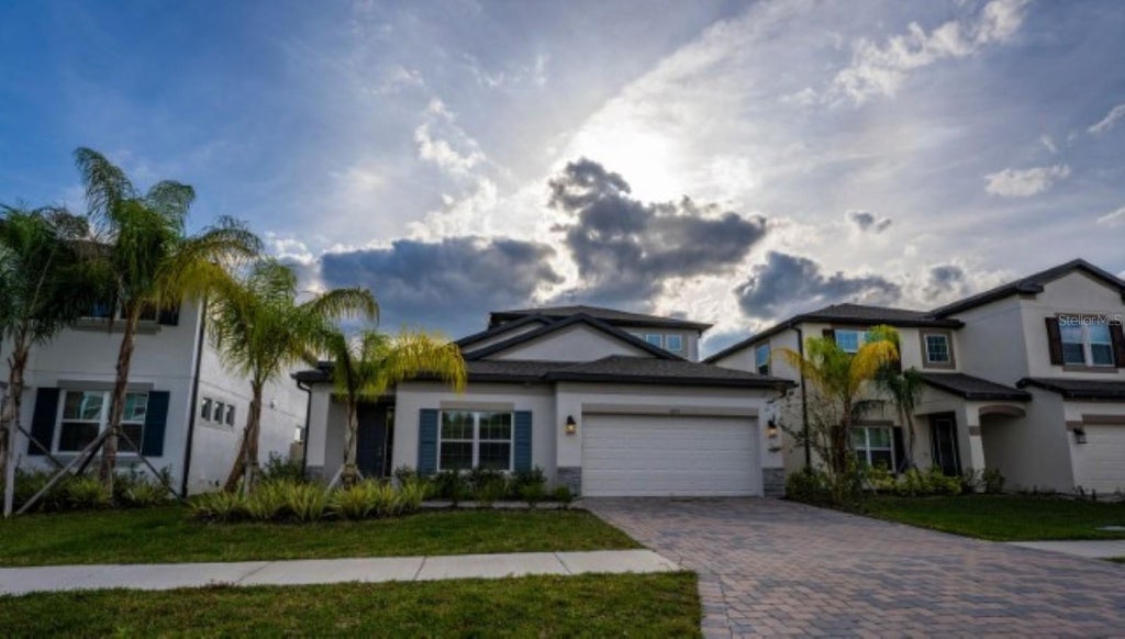 Photo of 10715 New Morning Drive, Tampa, FL 33647 (MLS # TB8552940)